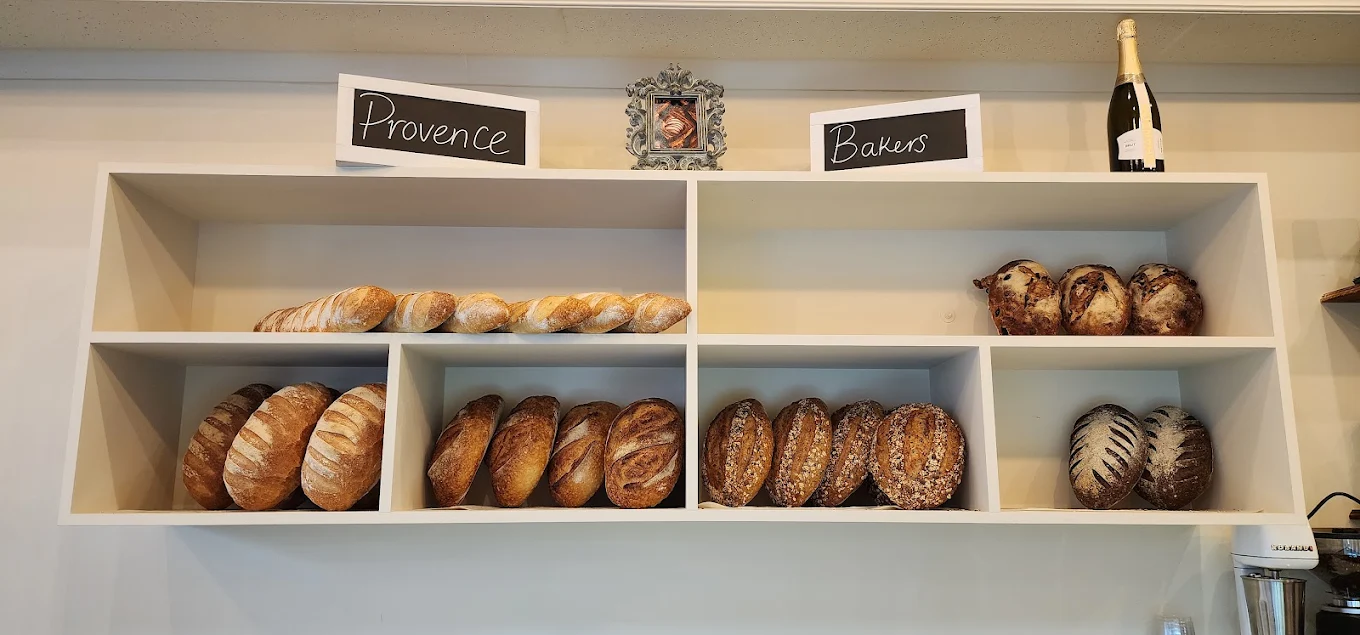 Shelves of artisan bread under the Provence sign